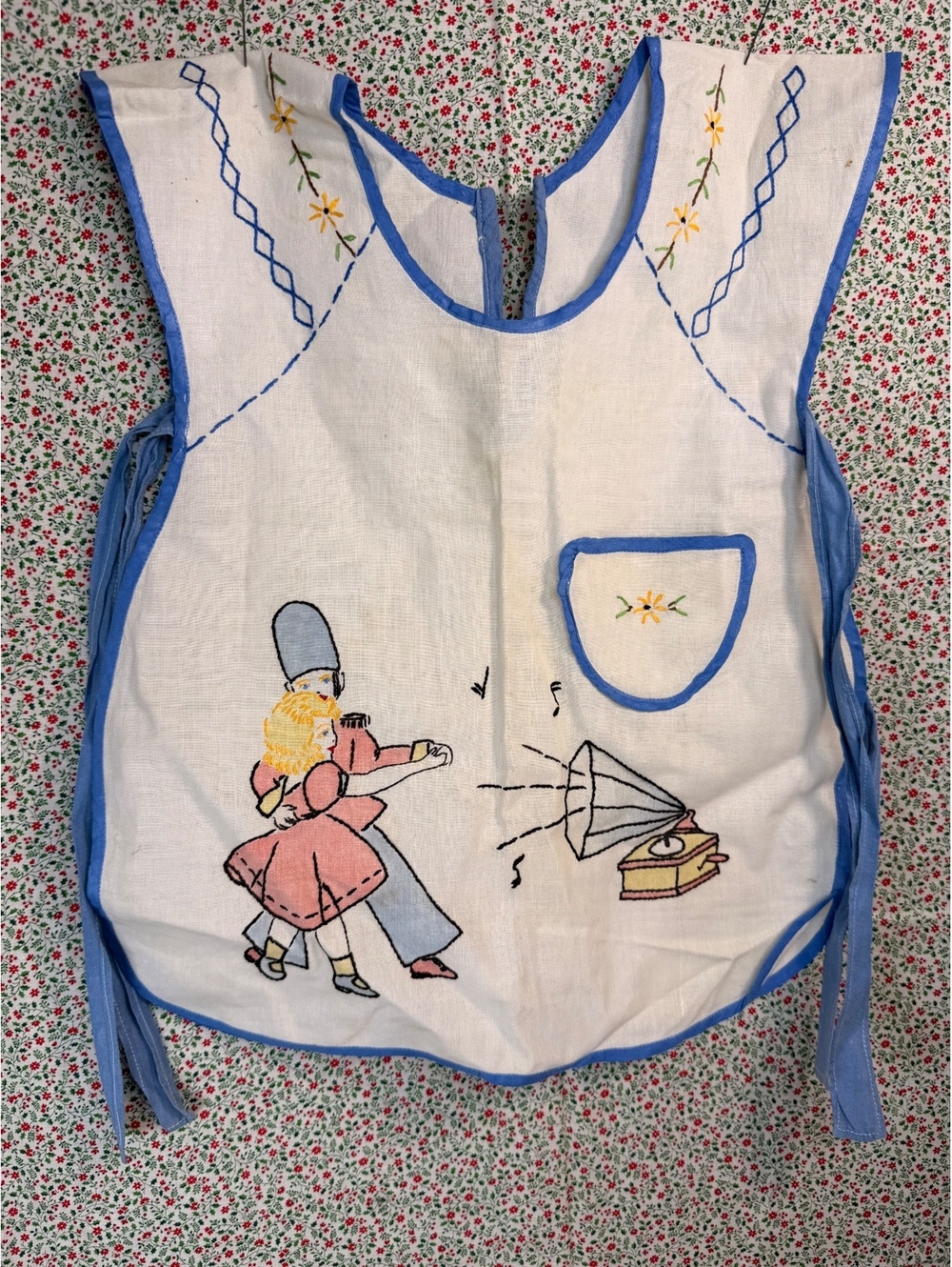 White children's apron with girl illustration
